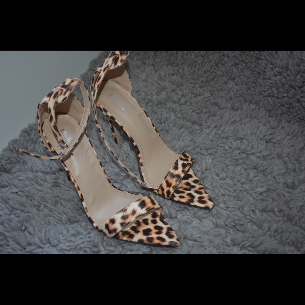 Leopard buckle heels